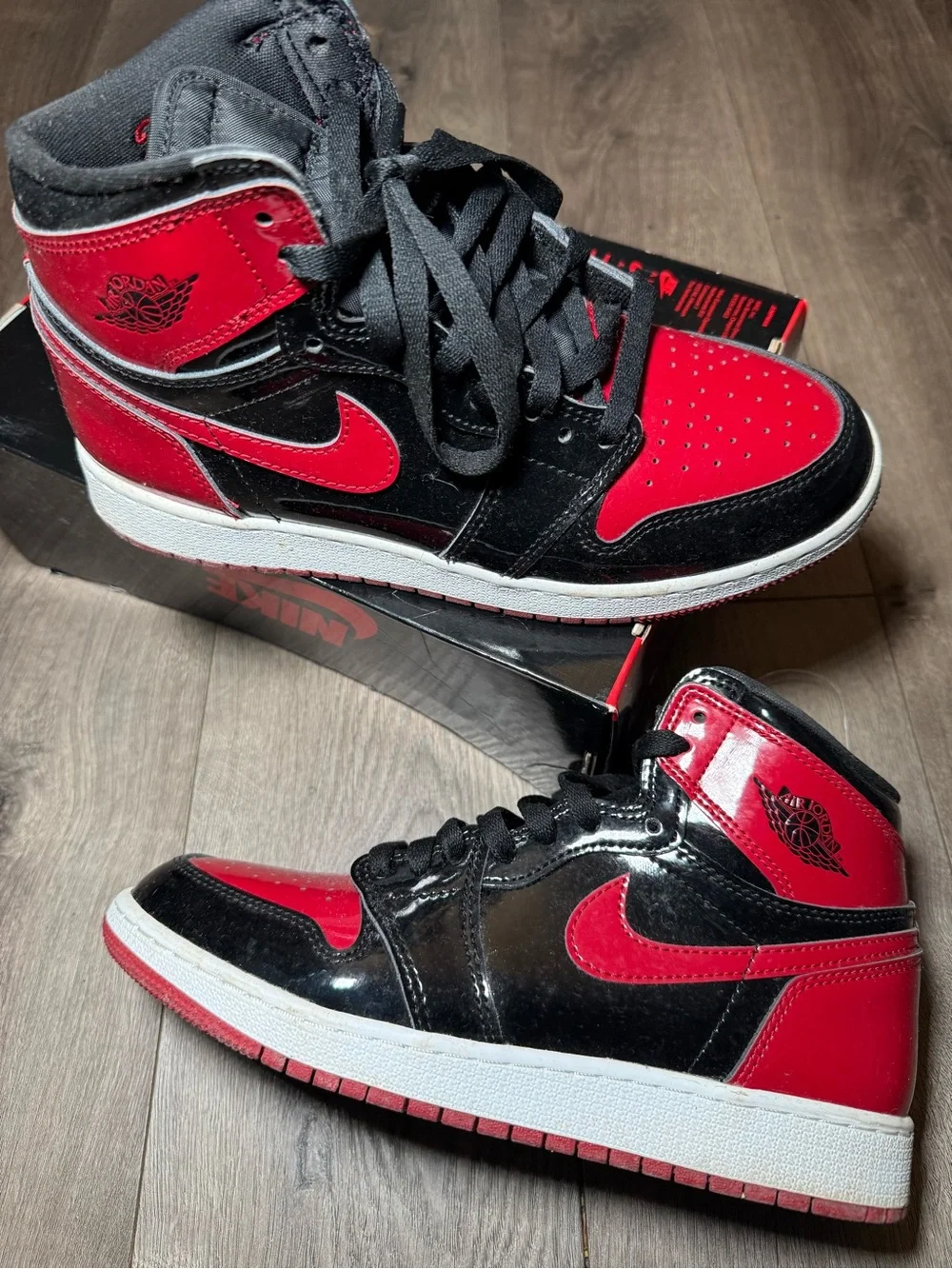 Nike Air Jordan 1 High-Top in Black and Red Patent leather
